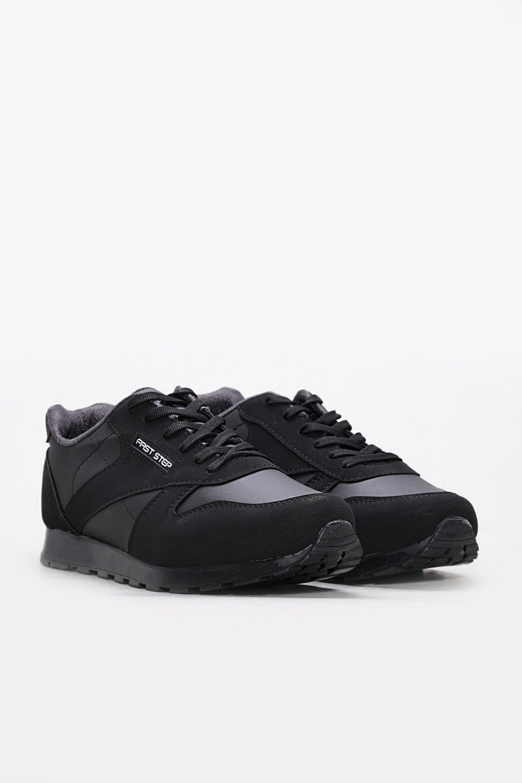 Black lace-up panel sneakers with textured sole, front three-quarter view