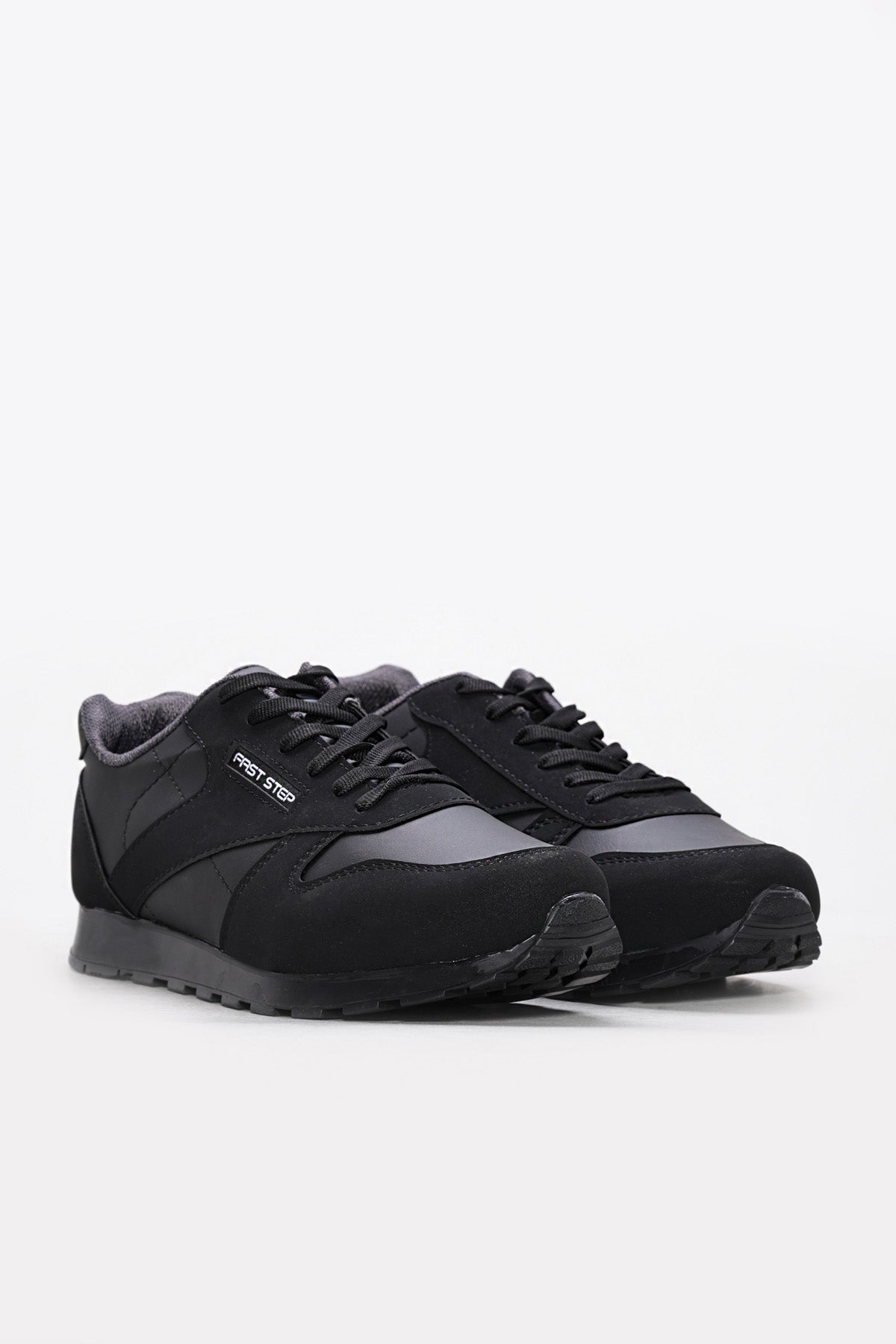 Black lace-up panel sneakers with textured sole, front three-quarter view