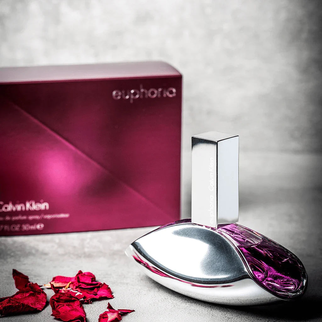 CK Euphoria eau de parfum bottle with silver cap and maroon box