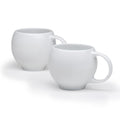 White ceramic teacup set of two with curved handles and smooth matte finish