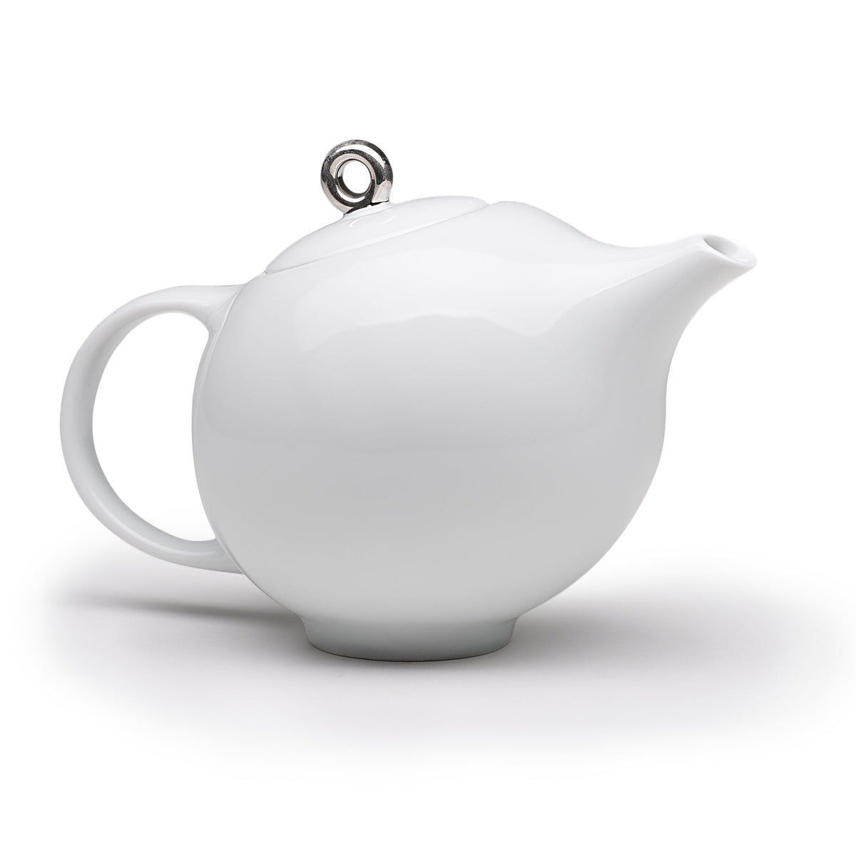 White ceramic modern teapot with round lid and metal loop handle