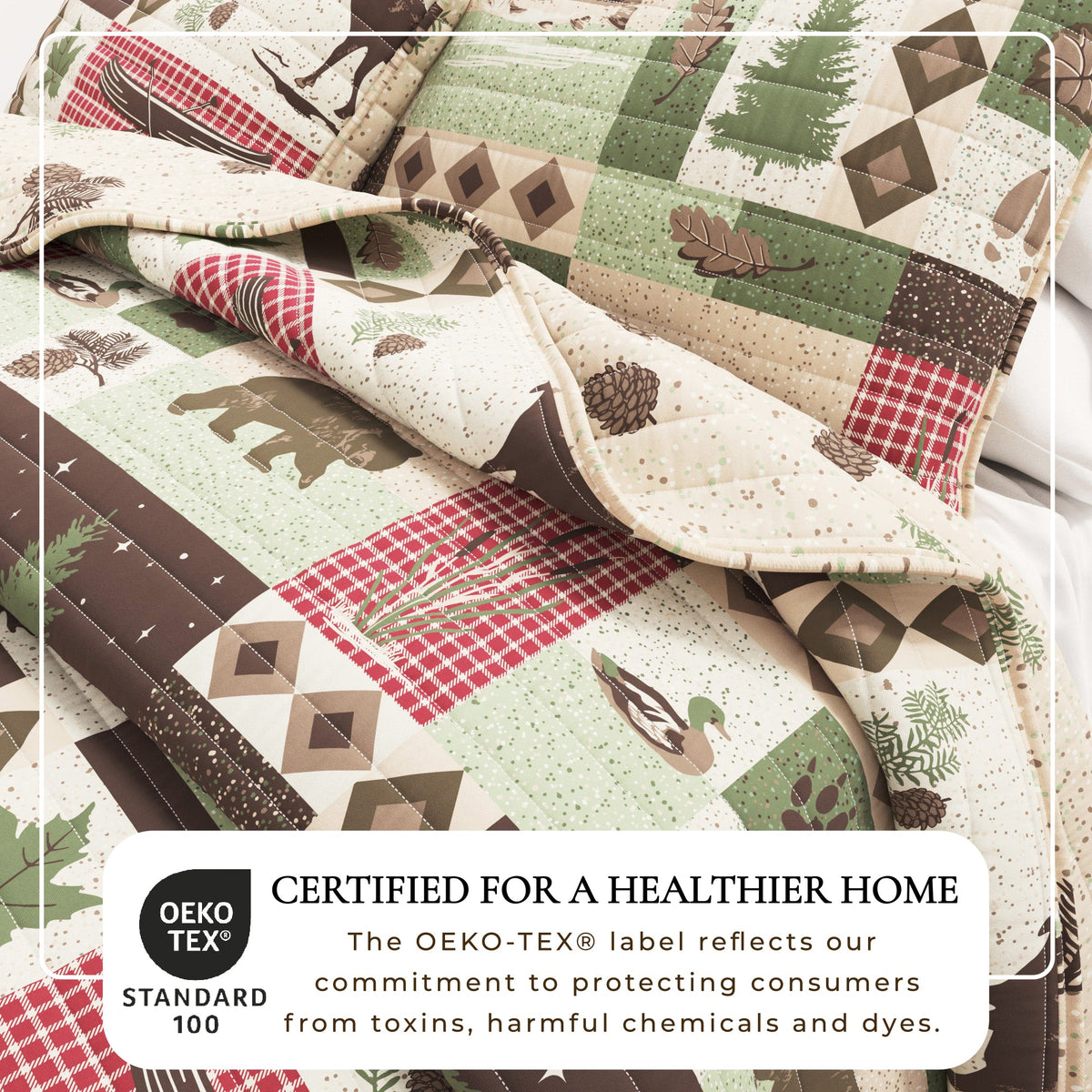 Close-up of lodge patchwork quilt fabric with plaid squares, diamonds, and trees