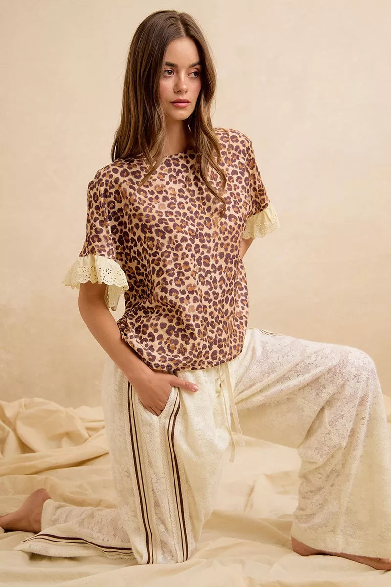 Leopard print ruffled top and matching shorts with eyelet lace edging