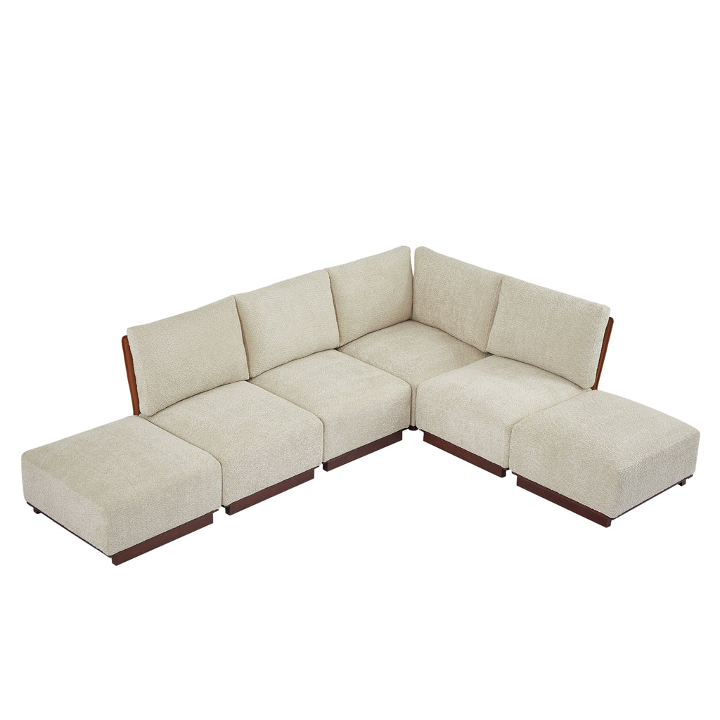 L-shaped sectional sofa with chaise modules, light sesame boucle fabric and dark base