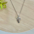 Silver arrowhead pendant necklace with textured metal arrowhead and link chain