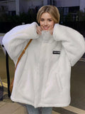 White sherpa fleece zip-up jacket with stand collar and chest logo patch