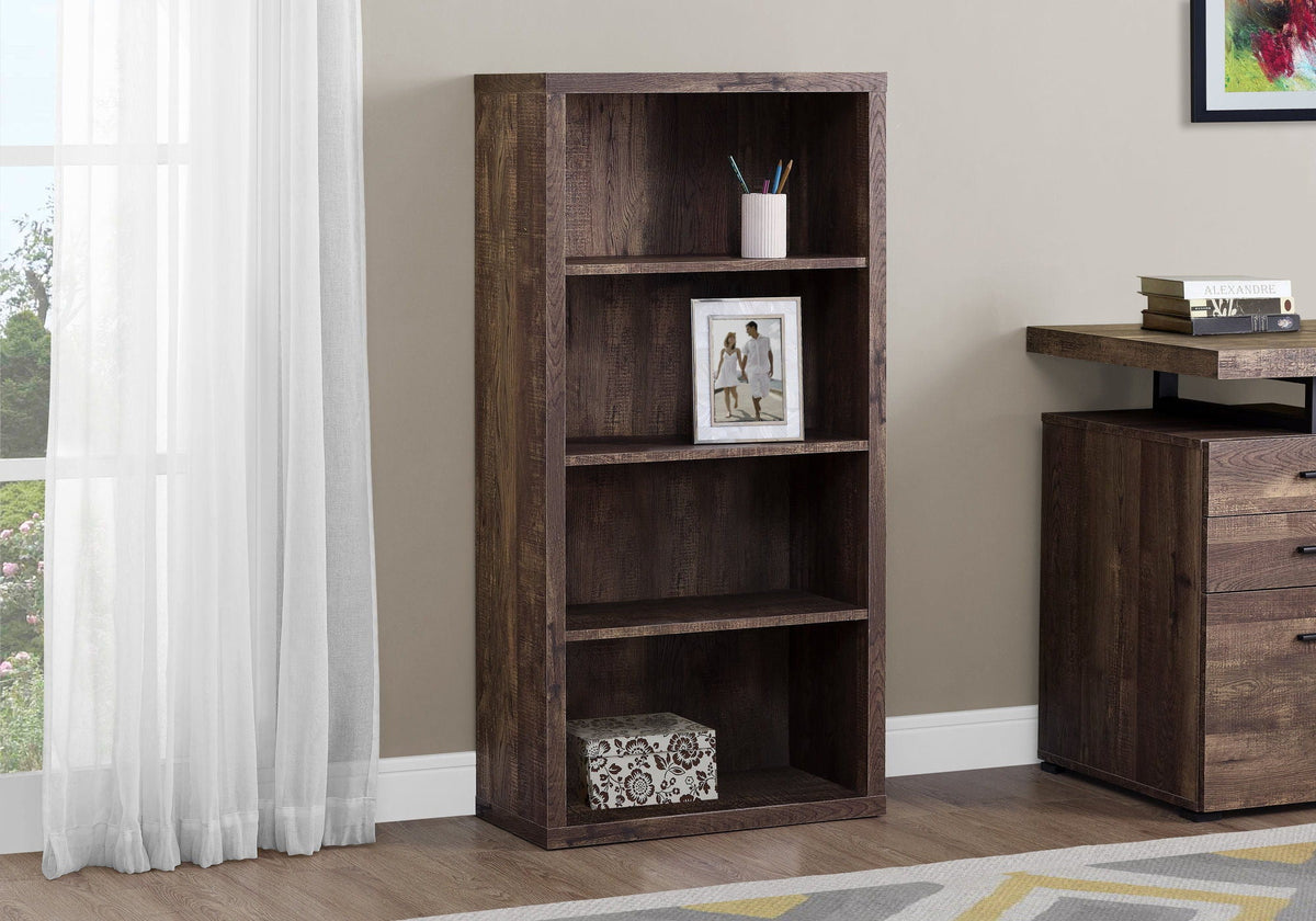 Dark brown tiered bookcase with open shelves, styled with decor and books