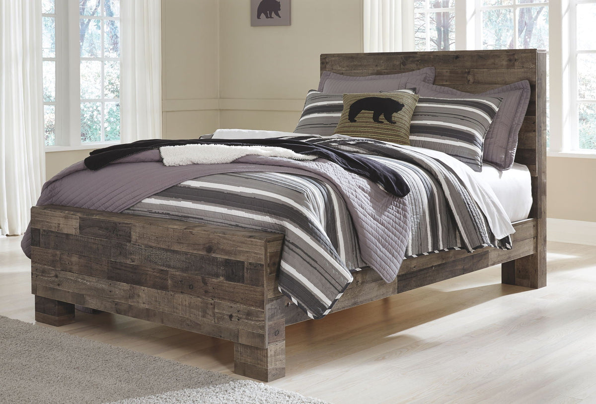 Youth panel bed set with dark wood frame and striped bedding, including panel headboard