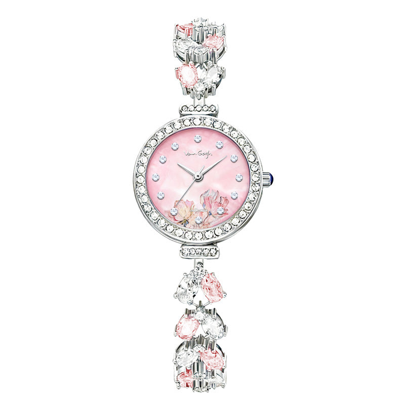 Pink floral dial wristwatch with rhinestone bezel and silver link bracelet