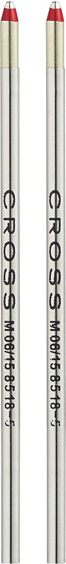 Close-up of two mini ballpoint pen refills with red tips and silver barrels