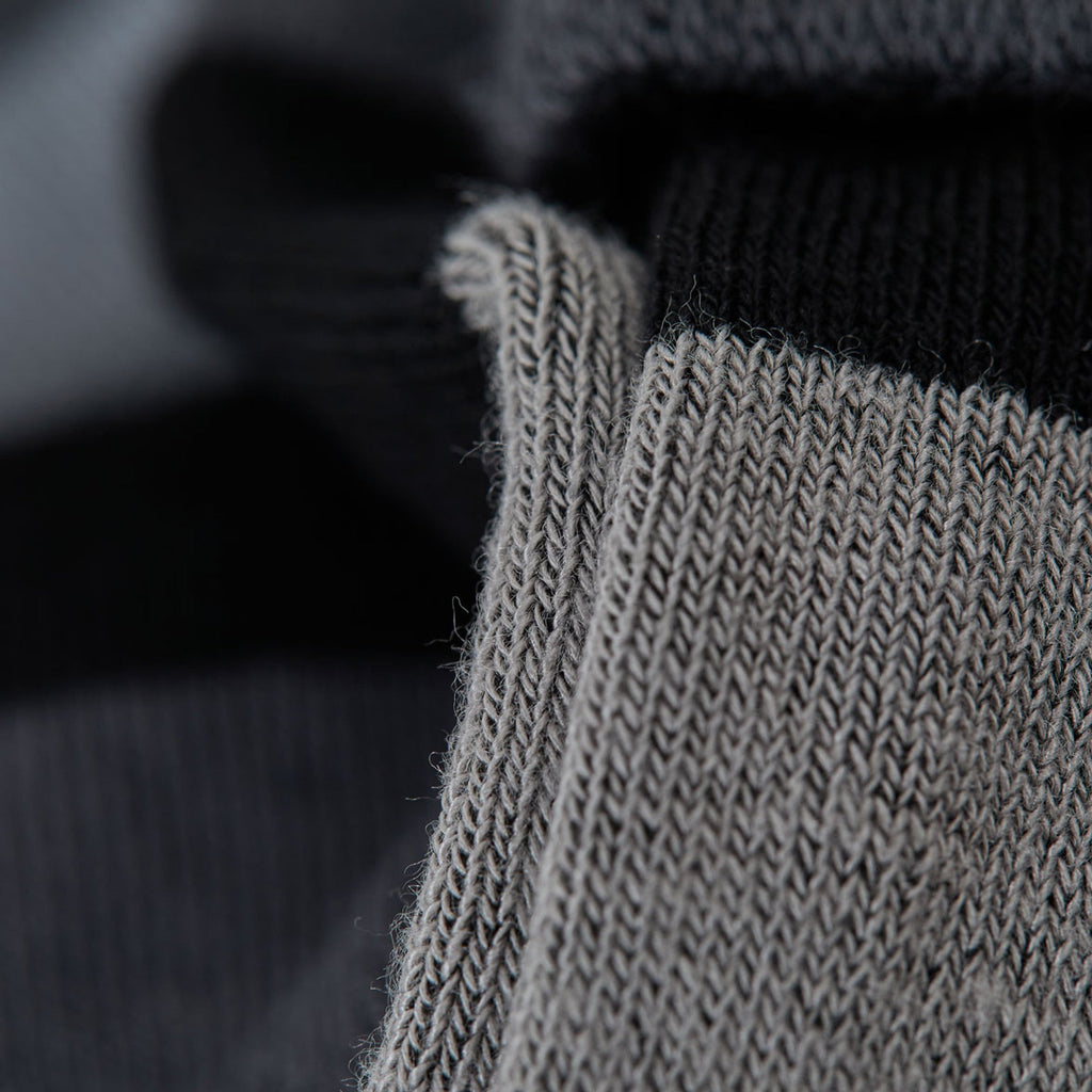 Ribbed knit sock cuff detail in light gray