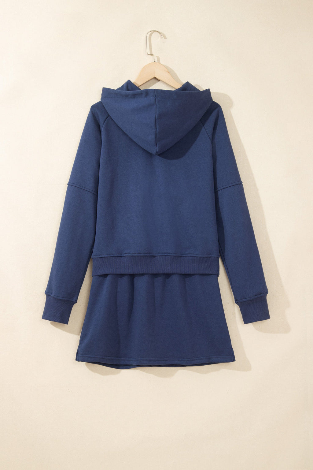 Navy hooded zip-up top and matching skort set with elastic waist and drawstring