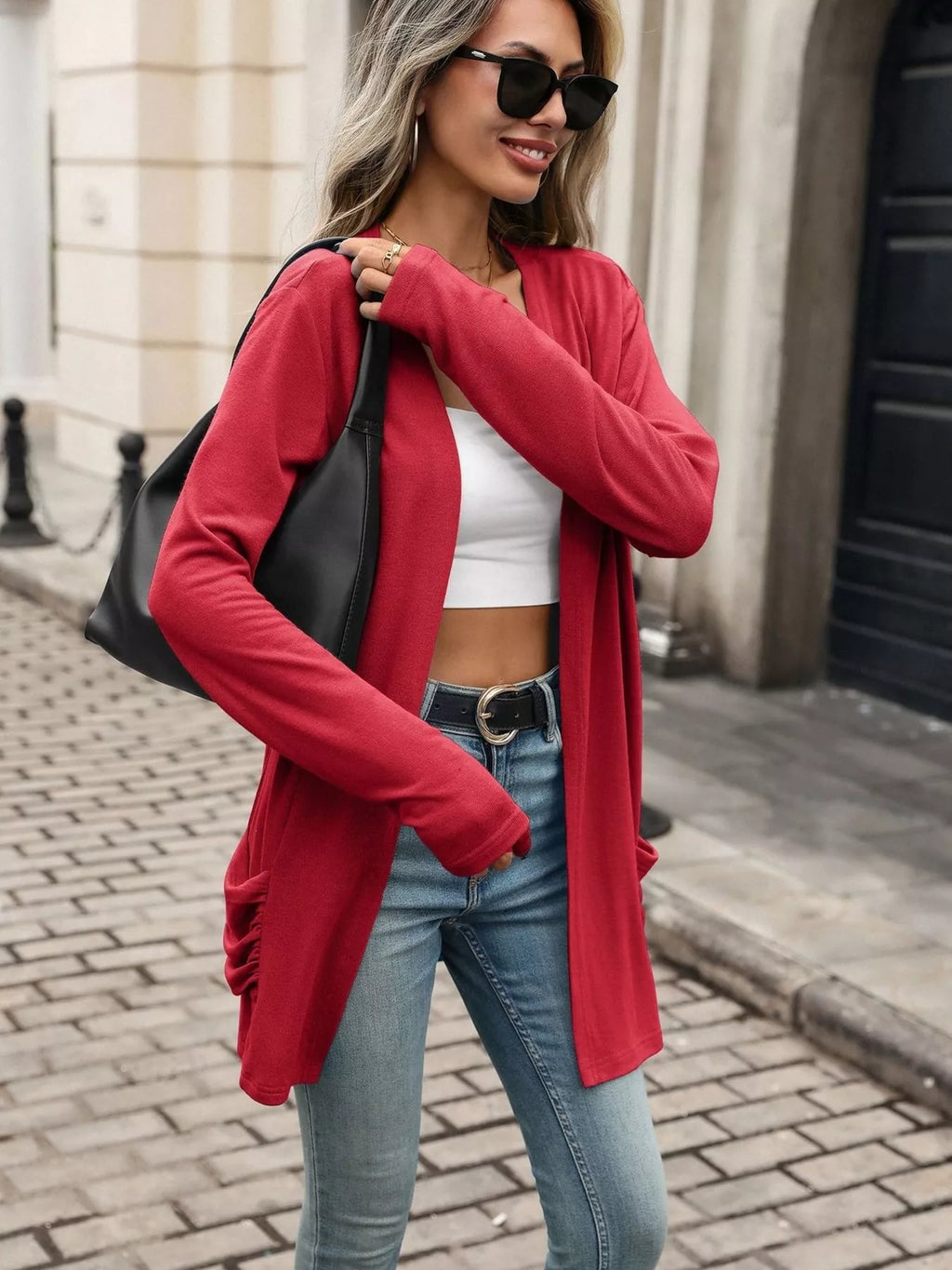Red open-front cardigan with ruched cuffs and side pockets, relaxed draped fit
