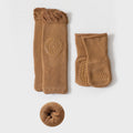 Camel-brown children’s crew socks with circular gripper pattern on the foot