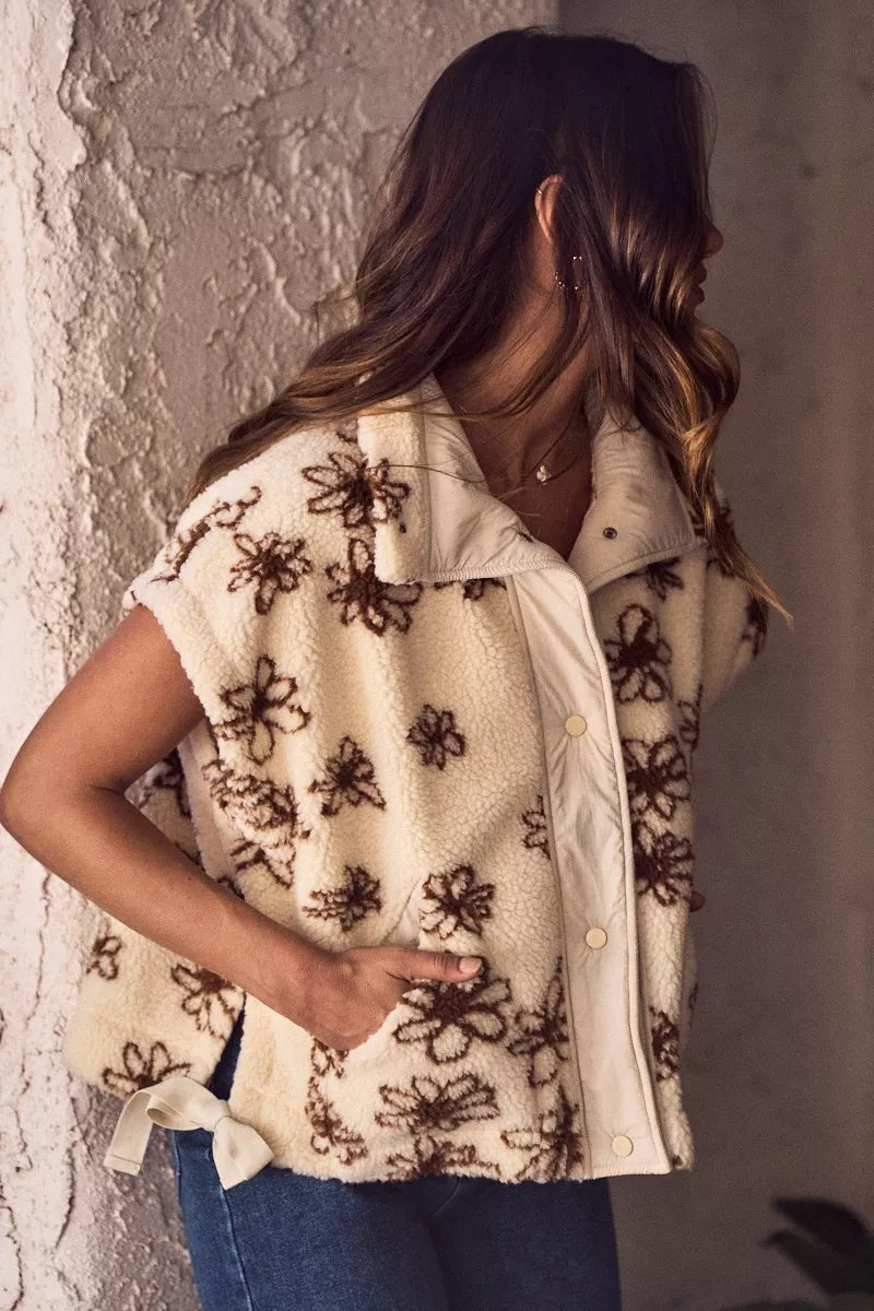 Oversized sleeveless sherpa vest jacket, cream with dark brown floral embroidery, back profile
