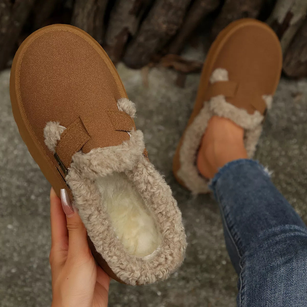Brown suede-style platform slippers with fuzzy trim and strap buckle detail