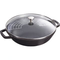 Round black enameled cast iron skillet with glass lid and two side handles