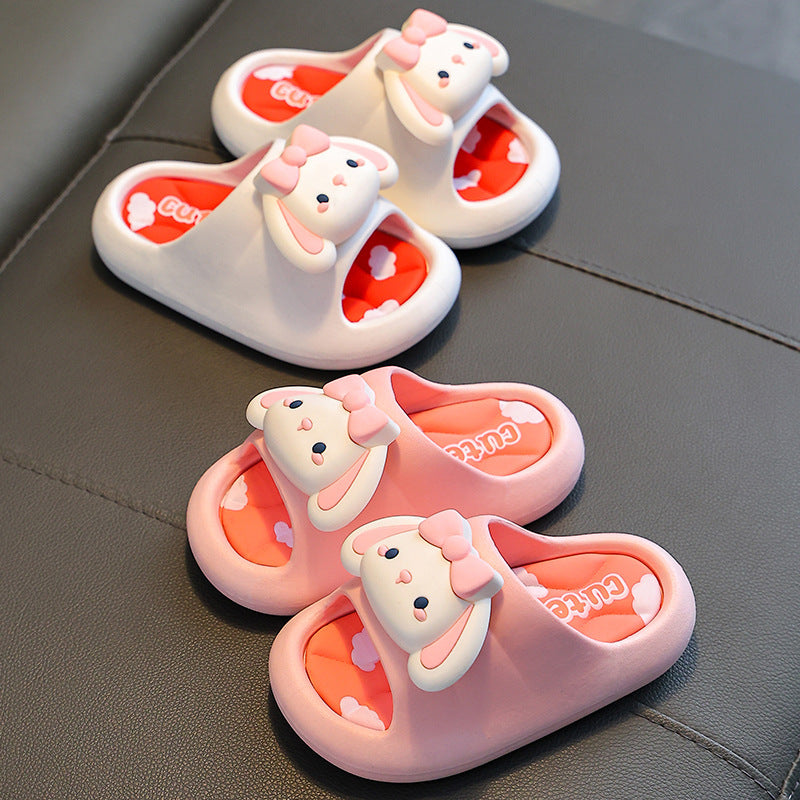 Set of kids bunny slide slippers: pink and blue pairs with heart-pattern lining