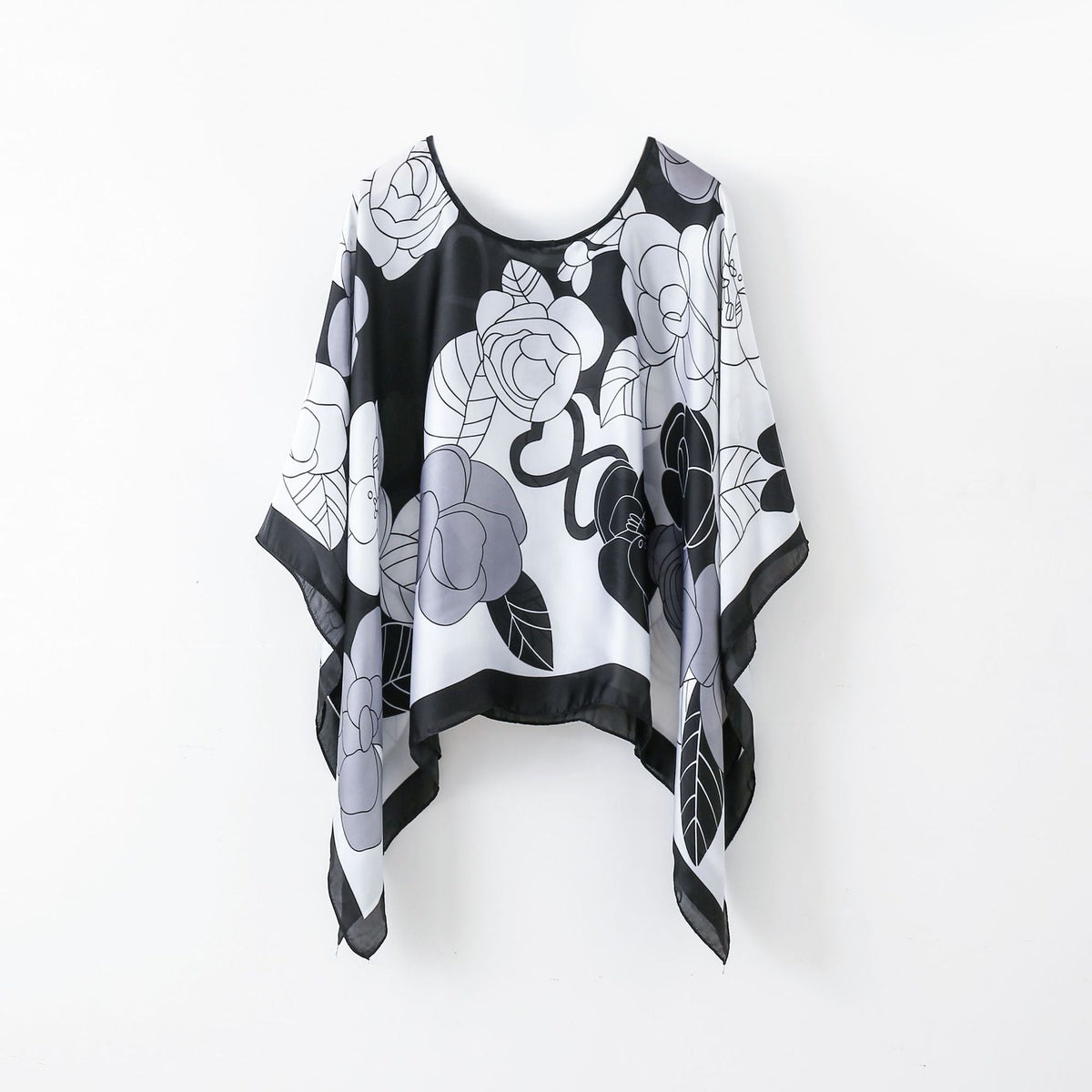 Black and white floral printed pullover shawl cover-up with draped short sleeves