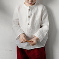 White cotton-linen boys long-sleeve shirt with half-open collar and wooden front buttons