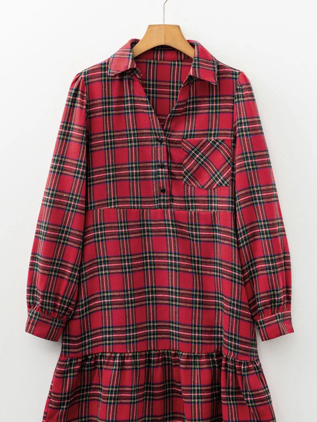Burgundy plaid mini dress on hanger with collar and half-button front