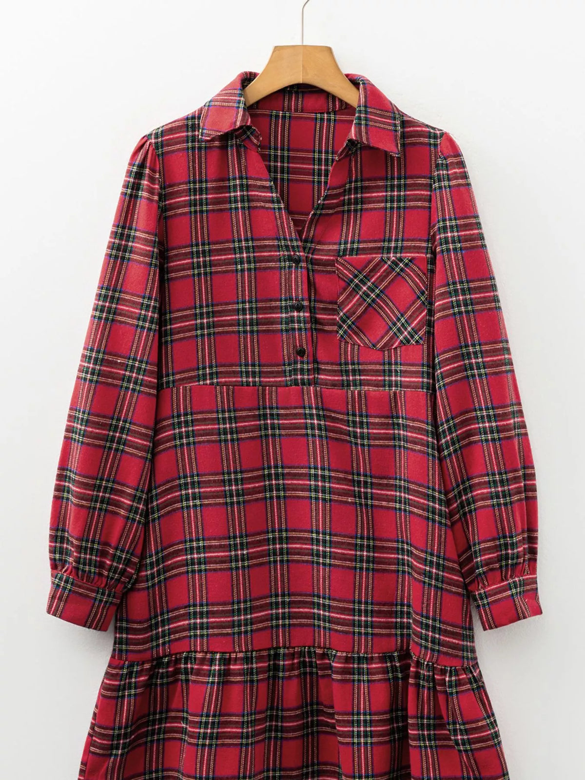 Burgundy plaid mini dress on hanger with collar and half-button front