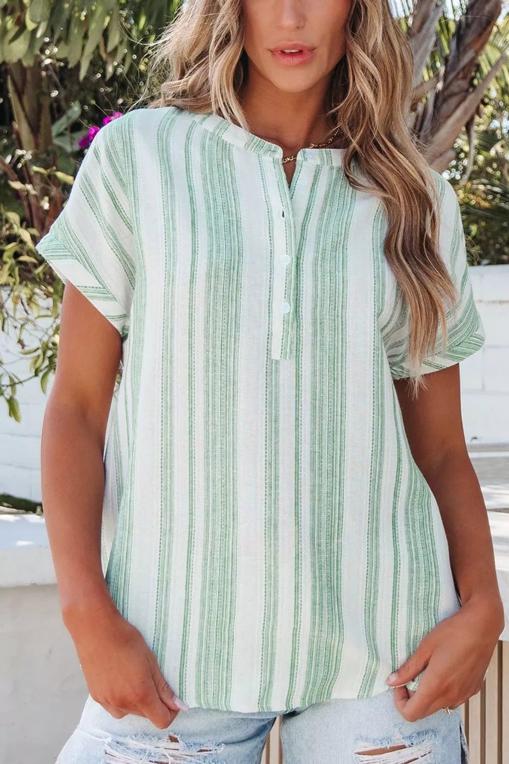 Light green striped gauze blouse with button-front and short sleeves