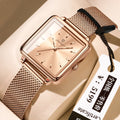 Rose gold square quartz watch with light dial and rose gold mesh metal band