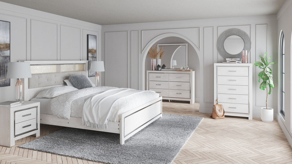 White panel bed with upholstered headboard and footboard