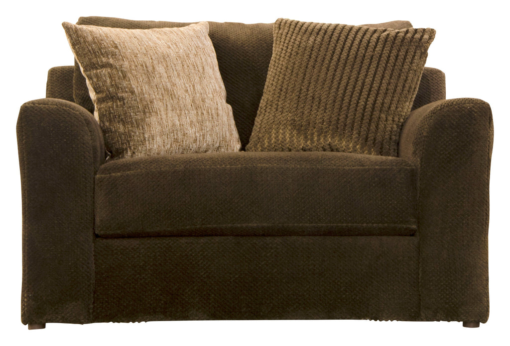 Upholstered armchair in dark brown with three decorative pillows and square arms