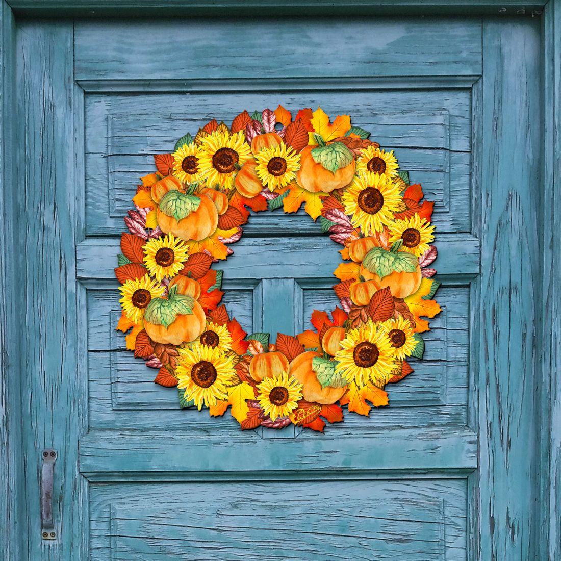 Fall door wreath with orange pumpkins and yellow sunflowers