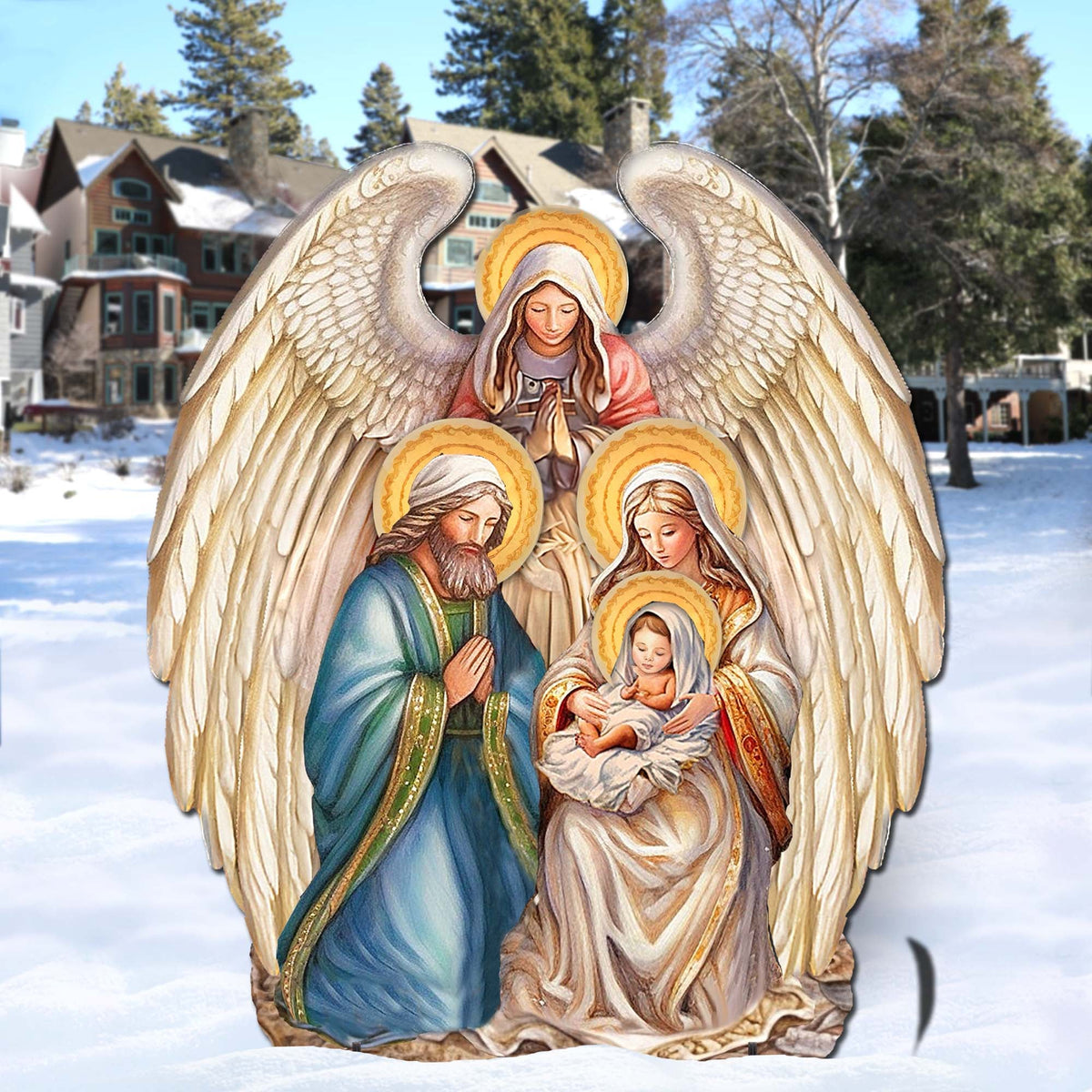 Nativity outdoor decor featuring angel and Holy Family figures under wide gold wings