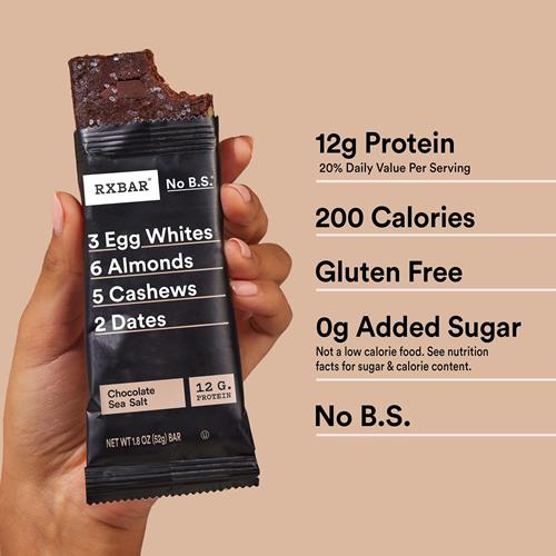 Hand holding RXBAR Chocolate Sea Salt protein bar showing 12 g protein and 200 calories