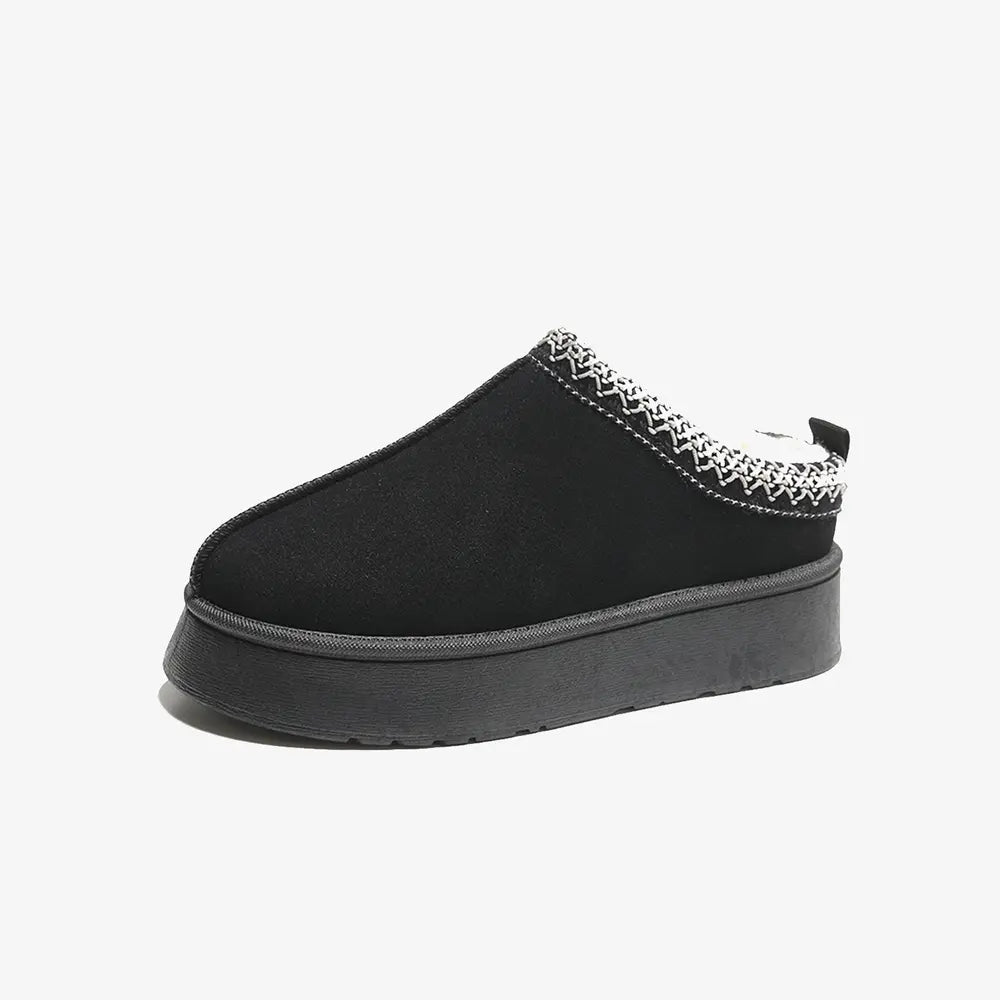 Black faux fur lined slip-on slipper, center seam, textured collar trim