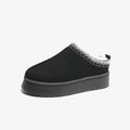 Black faux fur lined slip-on slipper, center seam, textured collar trim
