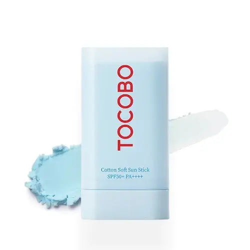 Light blue SPF sun stick tube with TOCOBO logo and pale cream smear.