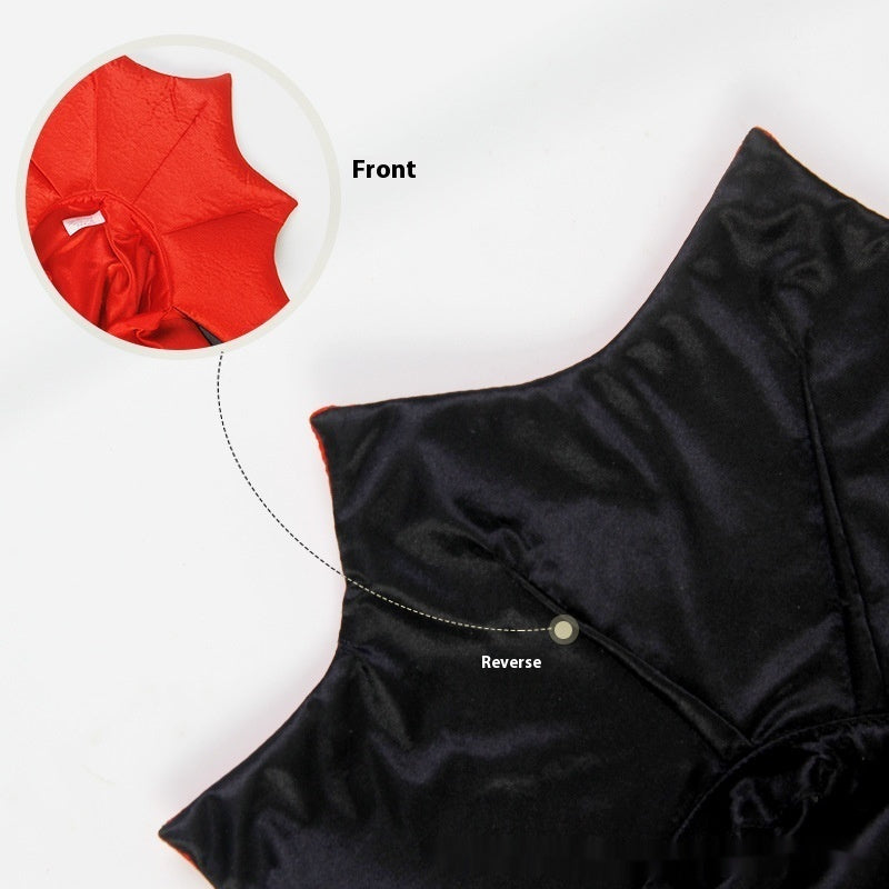 Pet vampire cape flat lay, black fabric with red front panel detail