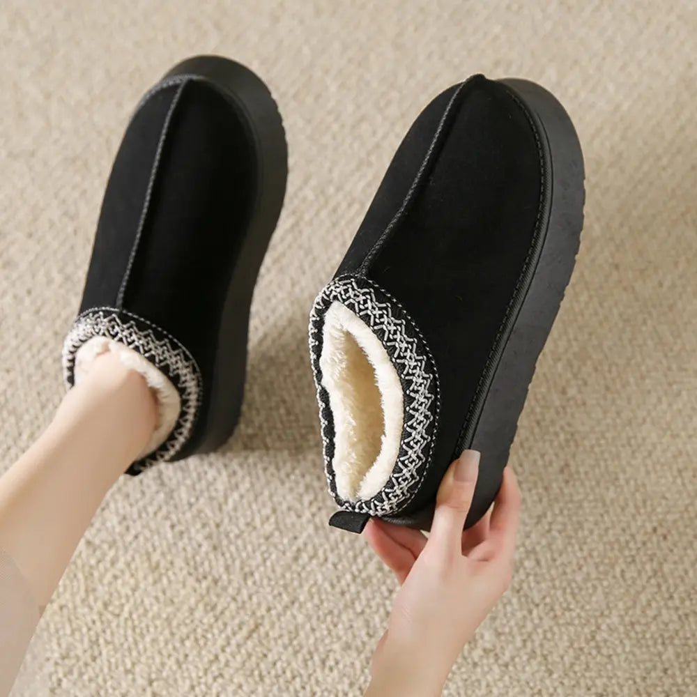 Black faux fur lined slippers, open collar detail, center seam