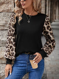Black long sleeve round-neck T-shirt with leopard print puff sleeves
