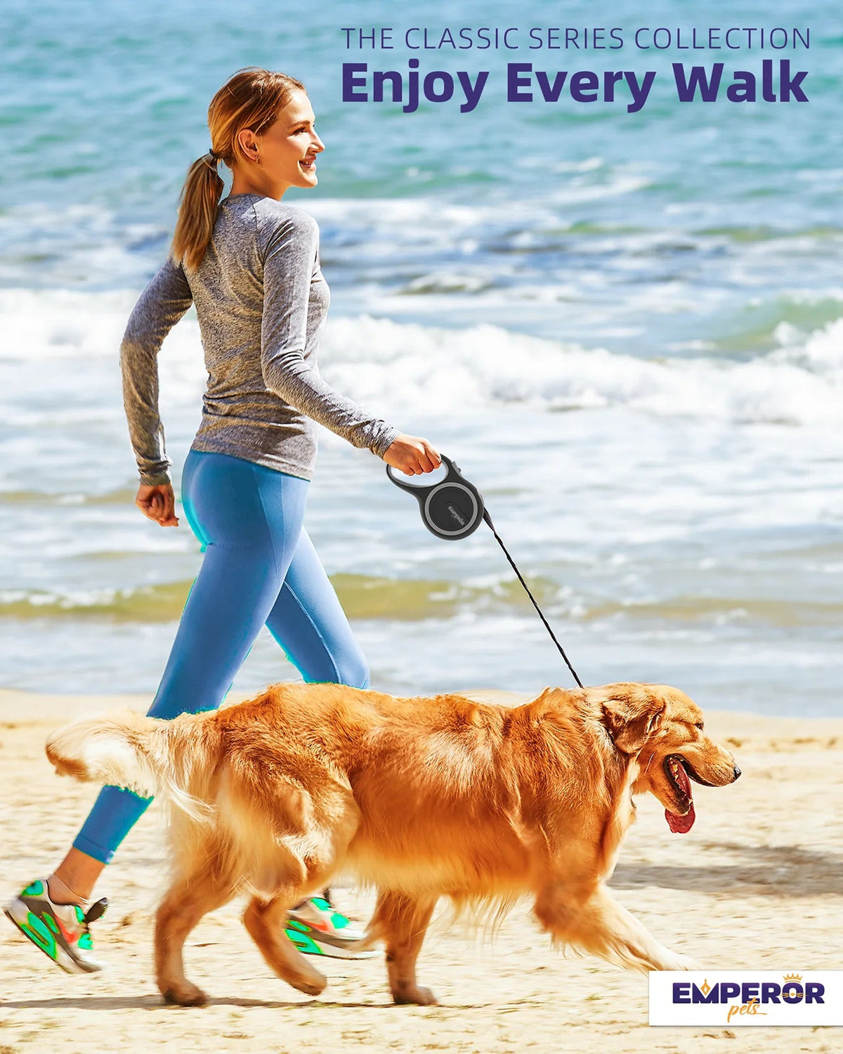 Gray retractable dog leash held by a woman walking a dog