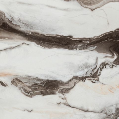 Close-up of beige and dark brown marble-look tabletop swirls