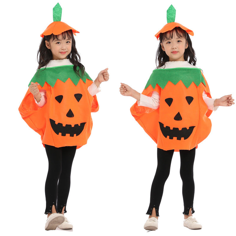 Child pumpkin costume poncho with jack-o-lantern face, green collar, and matching hat