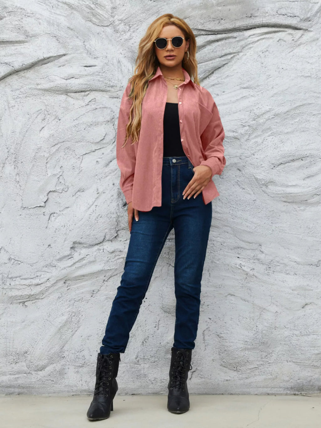 Pink corduroy button-up shirt with button front and a chest pocket