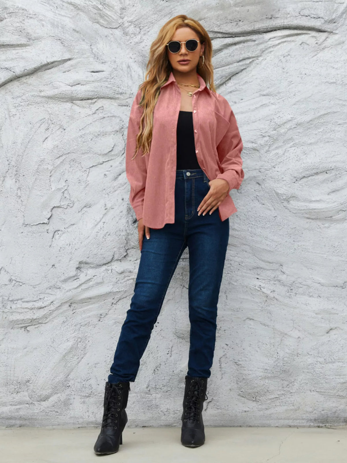Pink corduroy button-up shirt with button front and a chest pocket