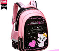 Small pink kids cat print backpack with black front panel, heart details, and top handle