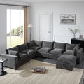 Gray chenille sectional sofa with chaise, corner module, and ottoman with storage.