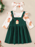 Green corduroy overall dress with reindeer applique over gingerbread print bodysuit