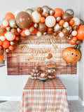 Woodland fall balloon garland kit with orange, tan, white and metallic balloons plus pumpkin sign