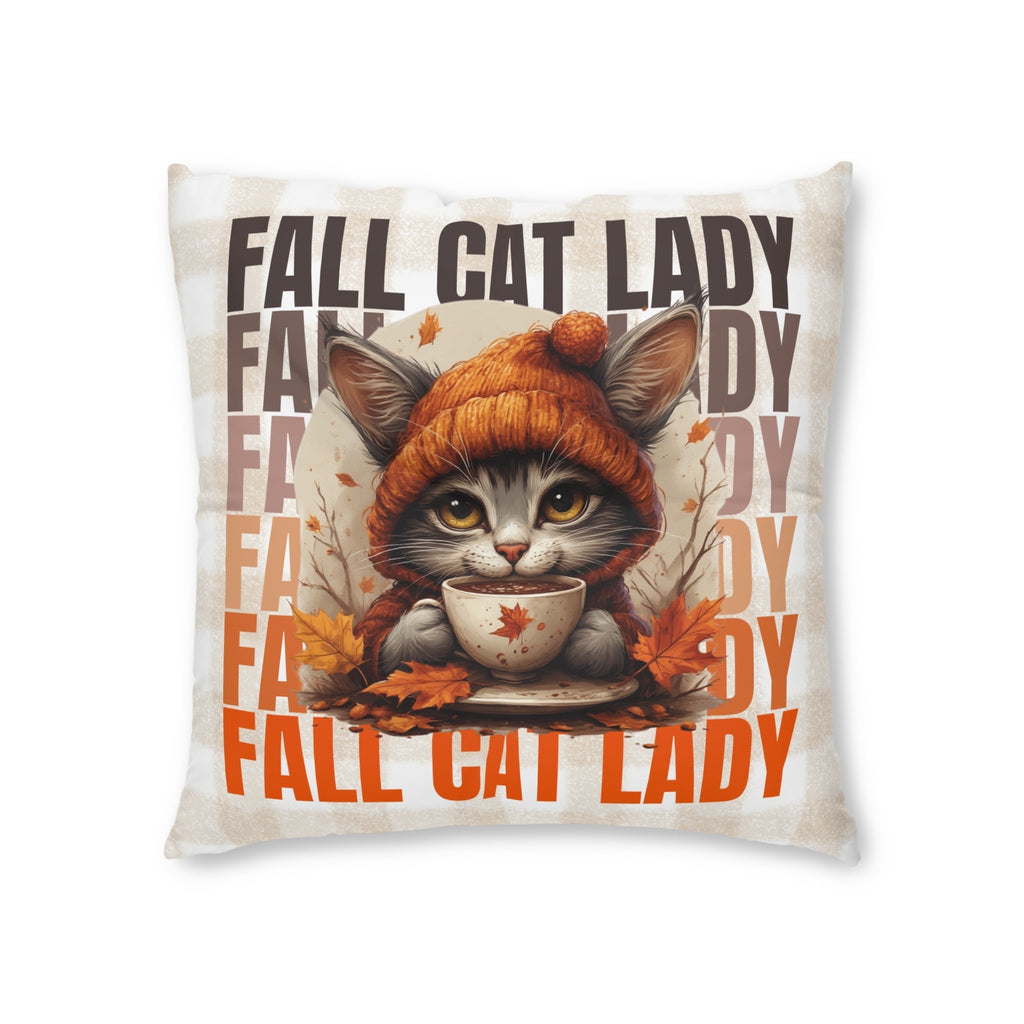 Tufted floor pillow with orange cat illustration sipping from a cup, fall leaves, bold text