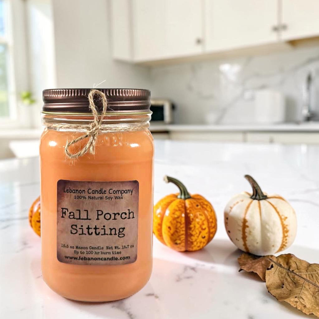 Fall Porch Sitting soy wax candle in amber glass jar with fall leaf accents